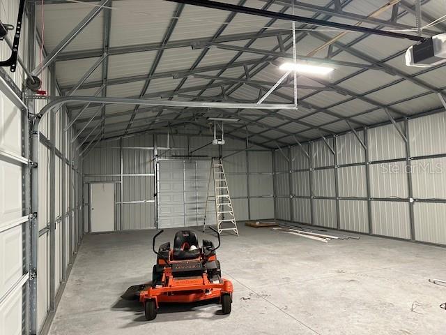 374 Sisco Road Pomona Park, FL 32181 - Photo 11 of 51 a car parked in garage