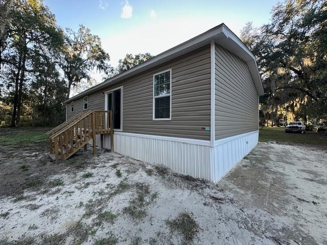 374 Sisco Road Pomona Park, FL 32181 - Photo 25 of 51 a view of backyard of house