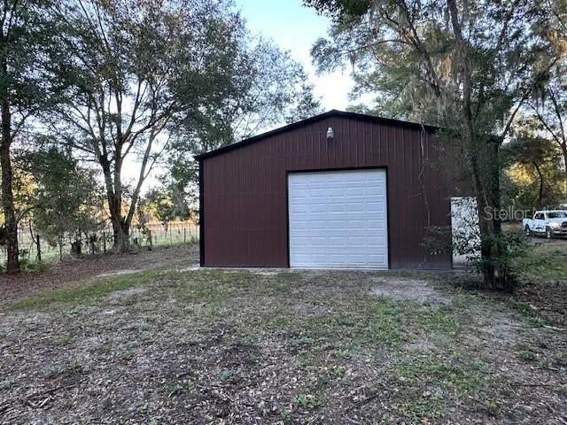 a house with trees in front of it