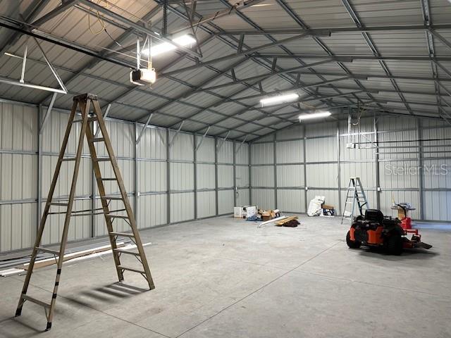 374 Sisco Road Pomona Park, FL 32181 - Photo 10 of 51 a view of gym equipment and a livingroom view