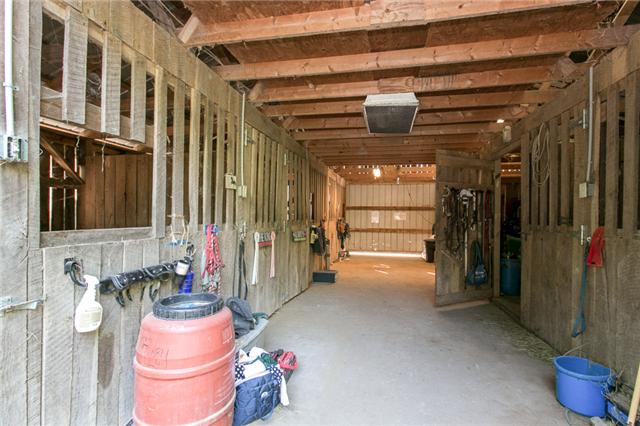 1725 Shell Road Goodlettsville, TN 37072 - Photo 20 of 20 5 Stall Barn with Tack stall has electricity and water - plus shed! Removable wall opens up divided stalls to large foaling stall!