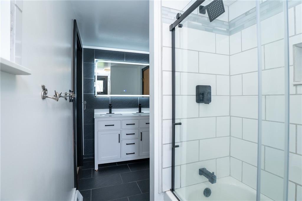 10 North Street Atlasburg, PA 15004 - Photo 13 of 27 a bathroom with a shower