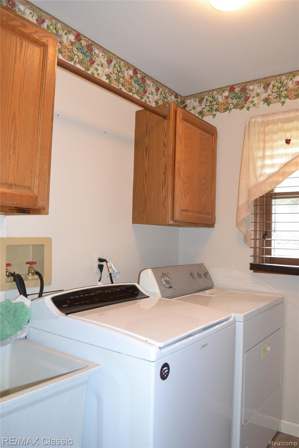 4350 Ravinewood Drive Commerce Township, MI 48382 - Photo 17 of 31 1st Floor Laundry Room