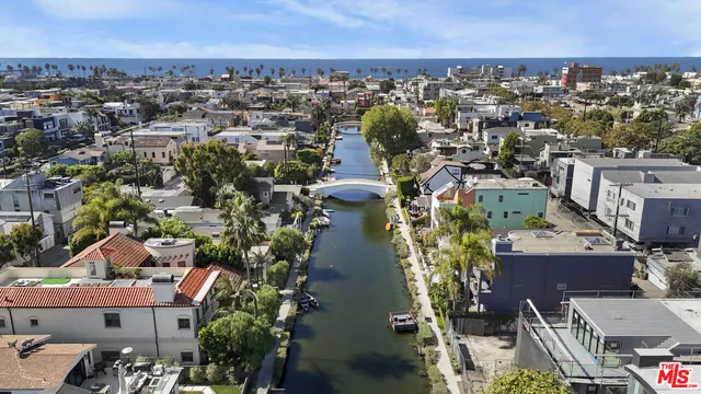 an aerial view of a city with lots of residential buildings