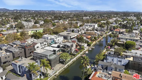 an aerial view of a city with lots of residential buildings