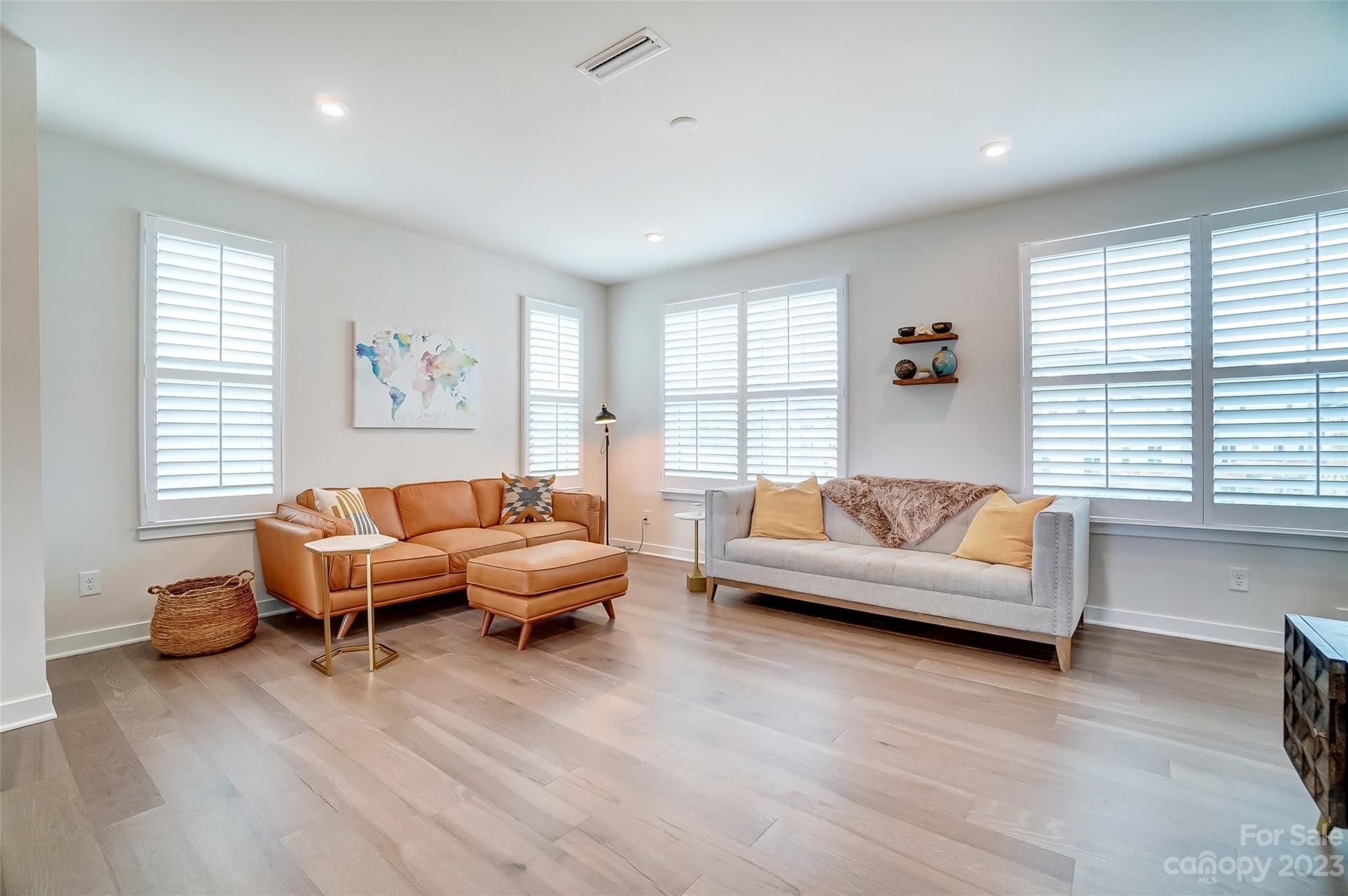 636 Crudent Road Tega Cay, SC 29708 - Photo 17 of 45 a living room with furniture and a large window