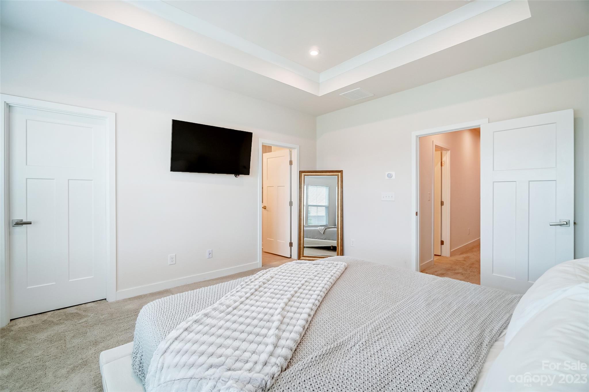 636 Crudent Road Tega Cay, SC 29708 - Photo 29 of 45 a bedroom with a bed and a flat screen tv