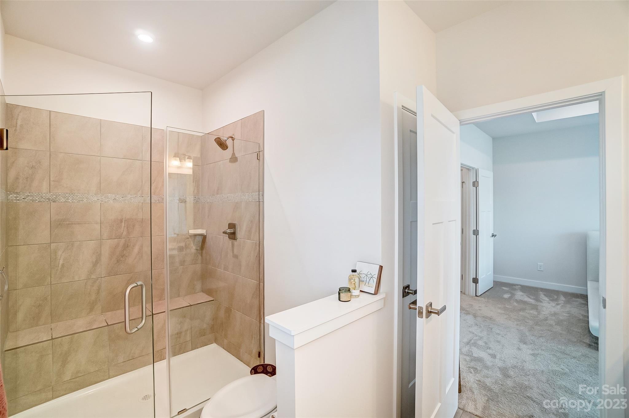 636 Crudent Road Tega Cay, SC 29708 - Photo 31 of 45 a bathroom with a shower and a sink