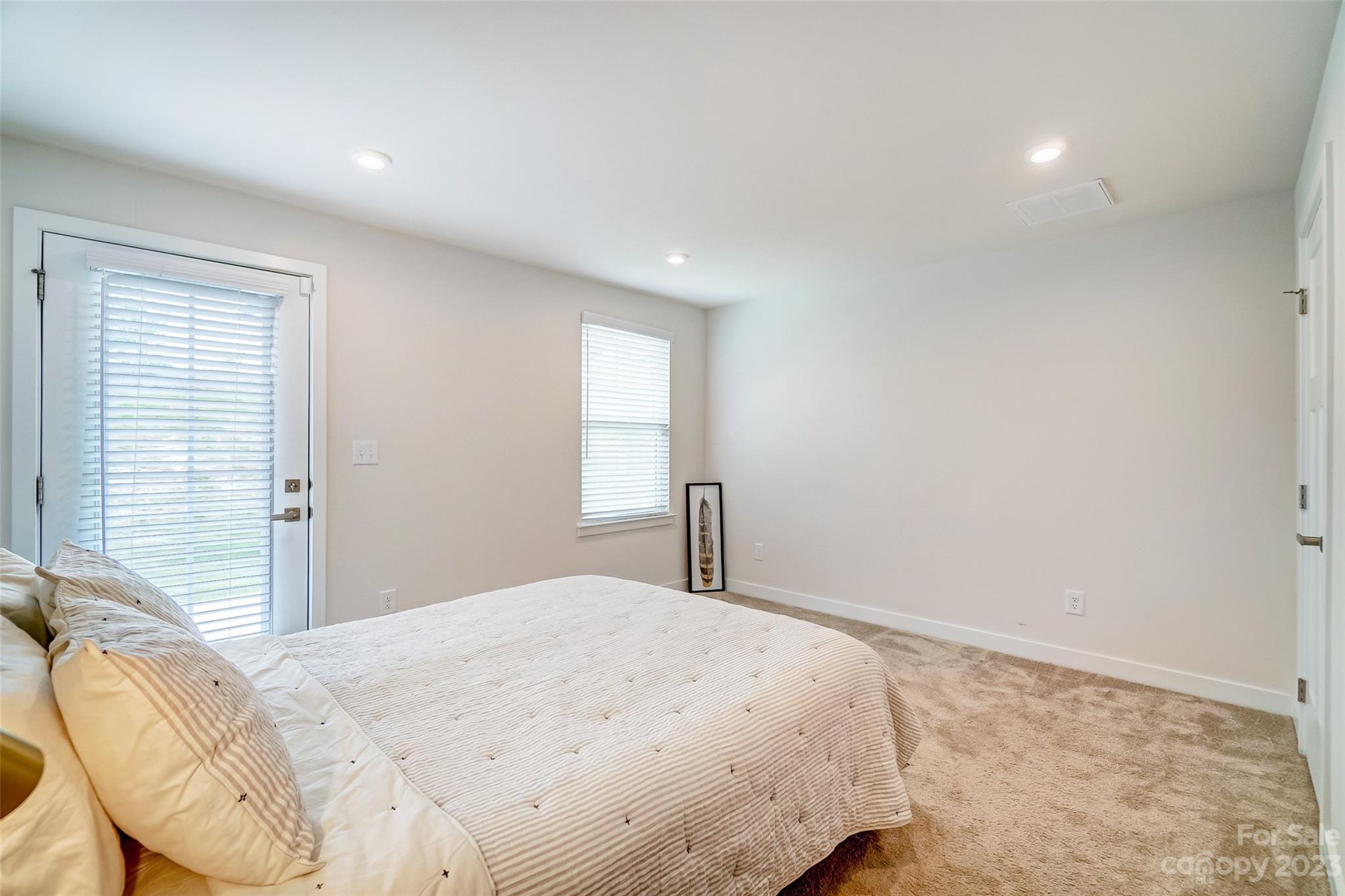 636 Crudent Road Tega Cay, SC 29708 - Photo 6 of 45 a bedroom with a bed and a window