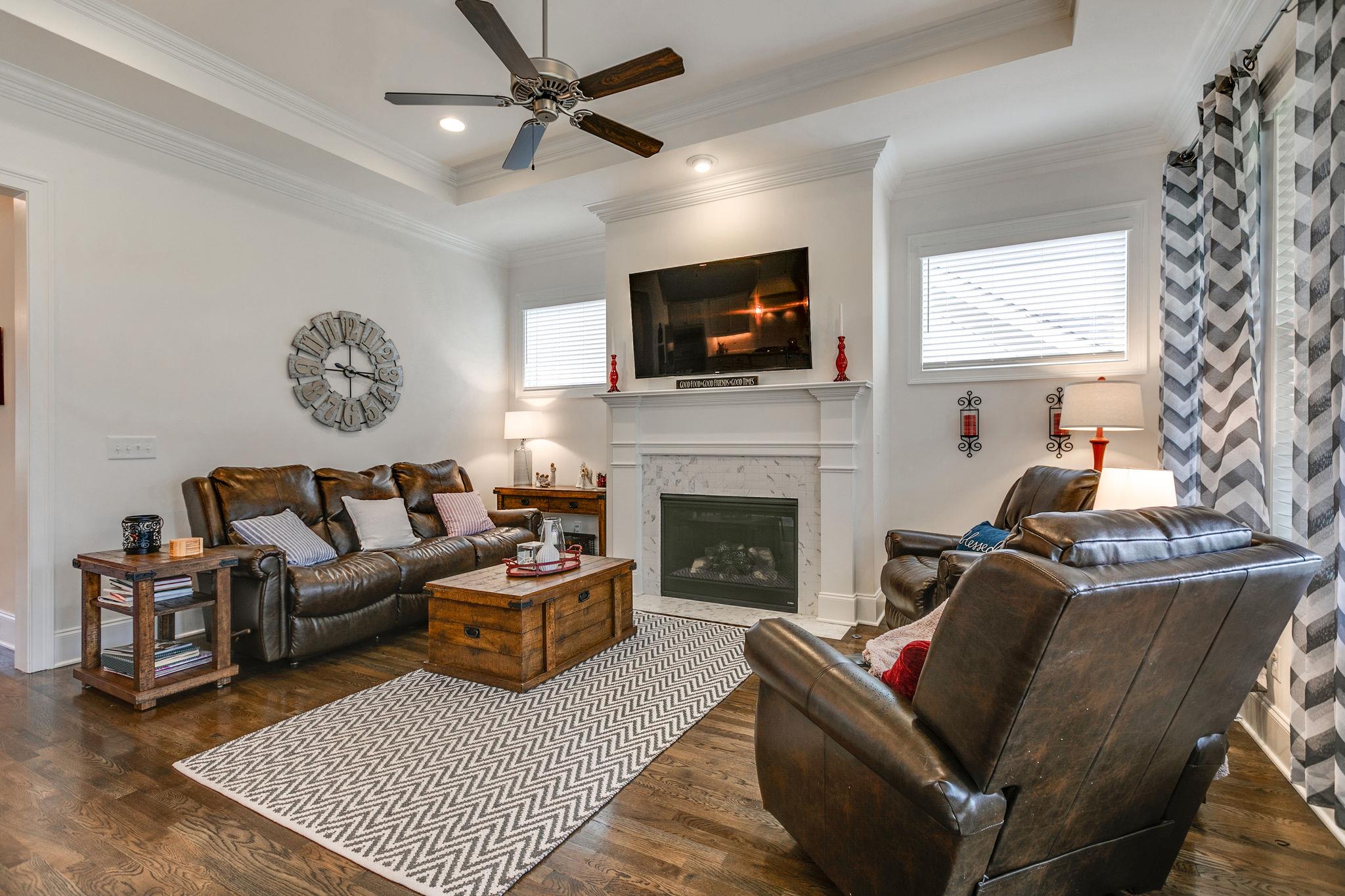 430 Alfred Ladd Road East Franklin, TN 37064 - Photo 6 of 30 Spacious Family Room with fin wood floors, 10 ft ceilings throughout first floor and fireplace with gas logs.