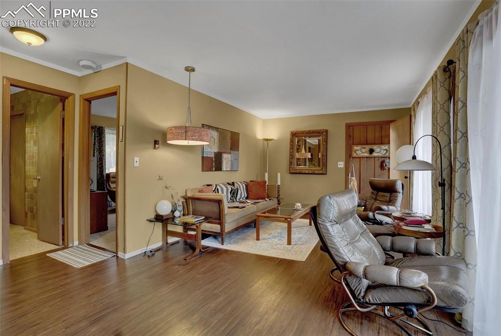 756 Spring Valley Drive Divide, CO 80814 - Photo 11 of 50 a livingroom with workspace and a couch