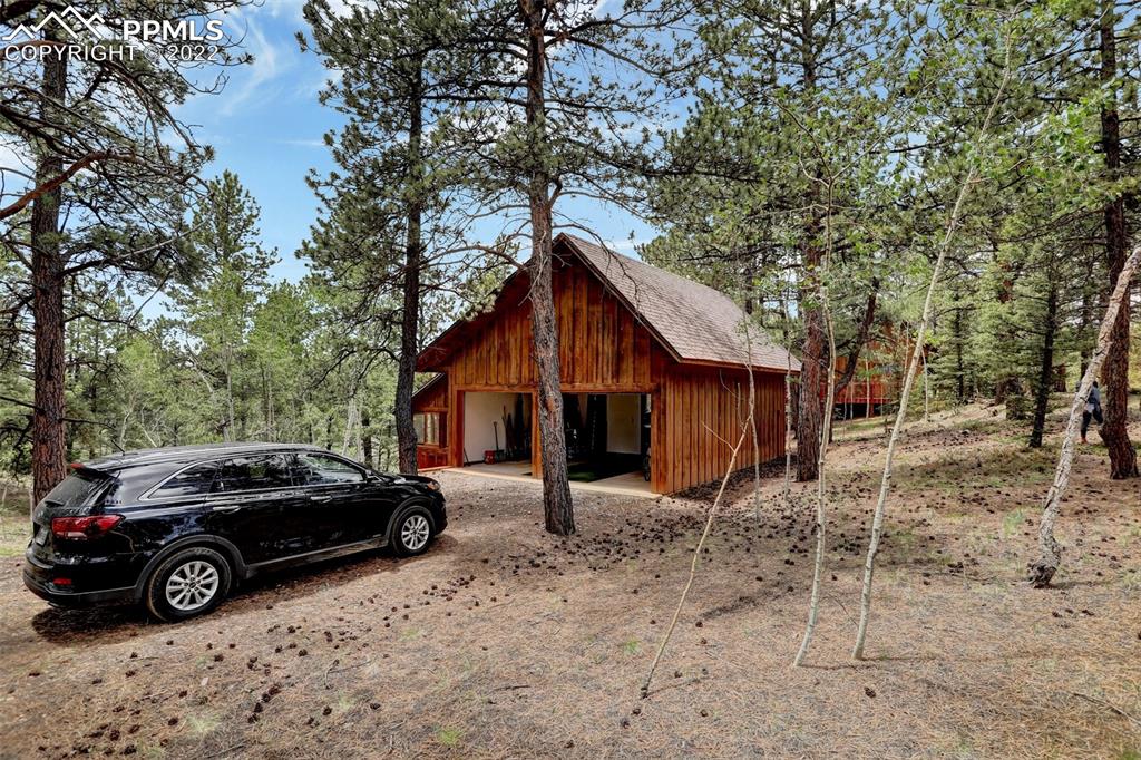 756 Spring Valley Drive Divide, CO 80814 - Photo 6 of 50 a view of a house with a yard