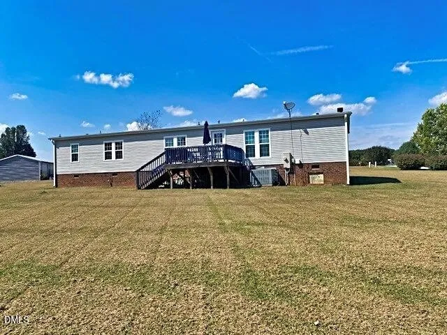 a view of a swimming pool and yard