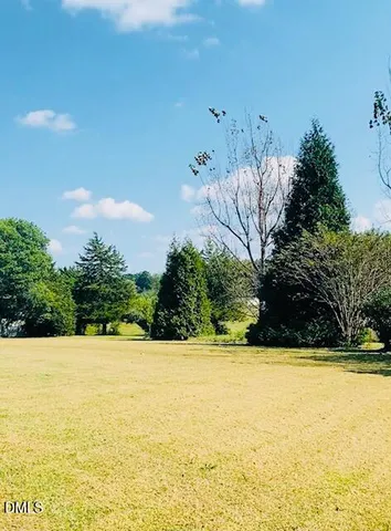 a view of an outdoor space and swimming pool