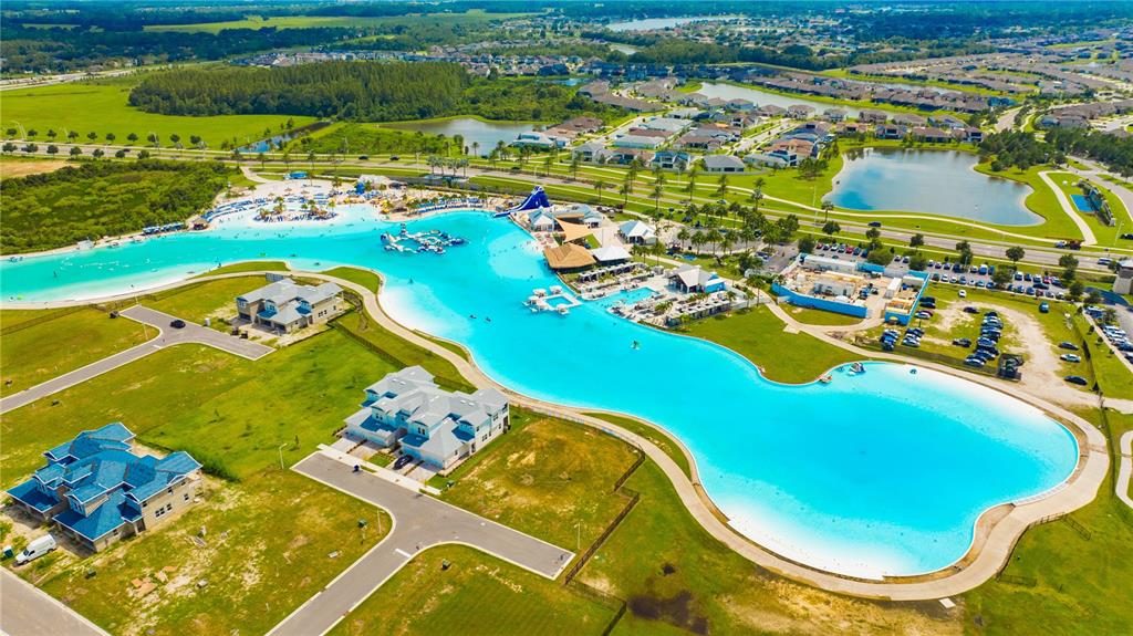 9610 Rally Spring Loop Wesley Chapel, FL 33545 - Photo 27 of 38 an aerial view of a pool yard swimming pool and outdoor seating