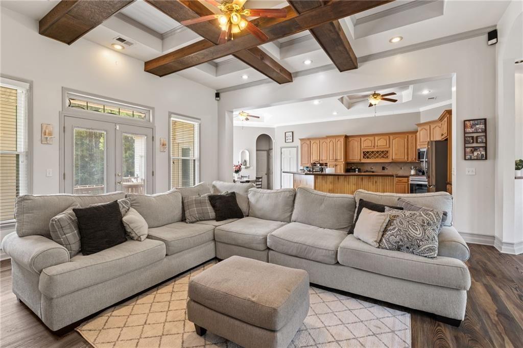 166 Freedom Lane Commerce, GA 30530 - Photo 9 of 23 a living room with furniture and a large window