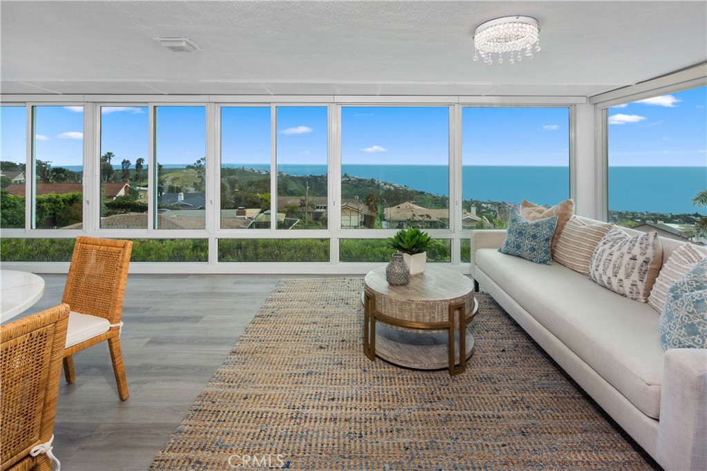 2805 Chillon Way Laguna Beach, CA 92651 - Photo 18 of 41 a living room with couch and a large window