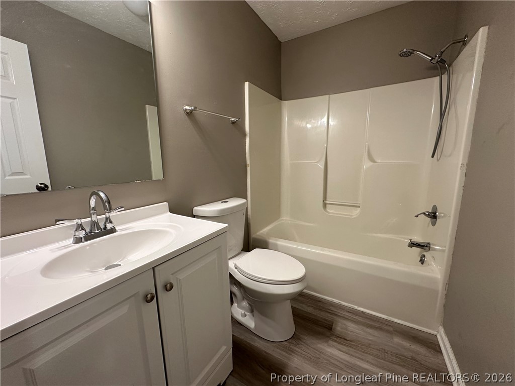 2678 Rivercliff Road Fayetteville, NC 28301 - Photo 11 of 19 a bathroom with a sink toilet and shower