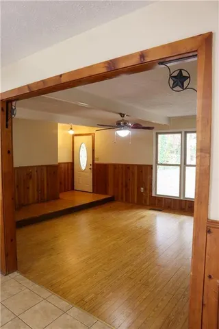 a view of a livingroom with wooden floor