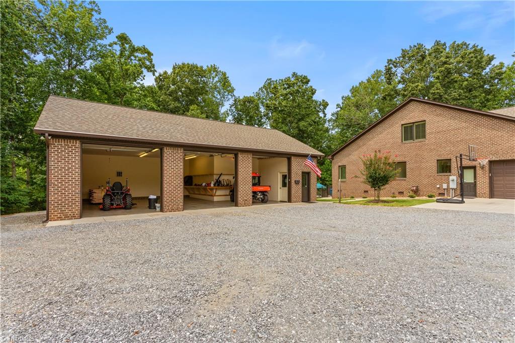 7869 Sutter Road Greensboro, NC 27455 - Photo 35 of 50 Detached garage with office.