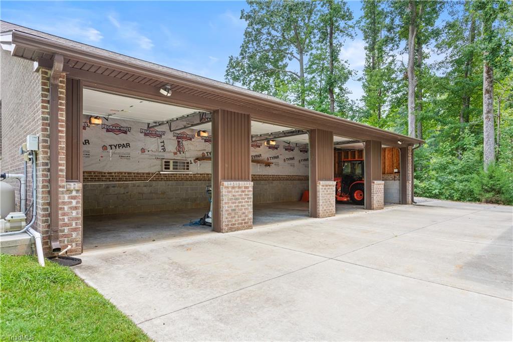 7869 Sutter Road Greensboro, NC 27455 - Photo 36 of 50 Detached garage with separate office