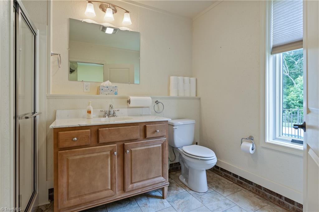 7869 Sutter Road Greensboro, NC 27455 - Photo 38 of 50 Bath in Office beside detached garage