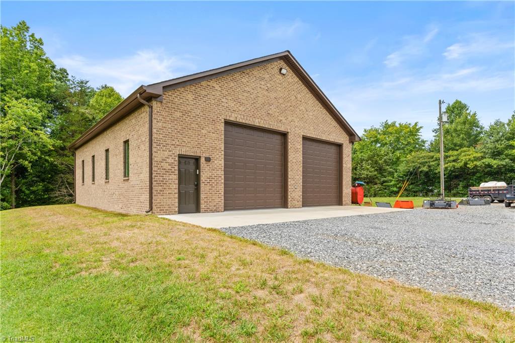7869 Sutter Road Greensboro, NC 27455 - Photo 42 of 50 Additional Detached garage can be used to store RV, boats, work equipment, multiple vehicles and more!