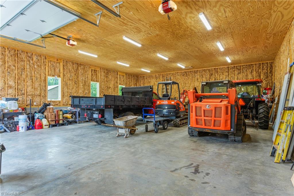 7869 Sutter Road Greensboro, NC 27455 - Photo 43 of 50 Interior view of Large detached garage.