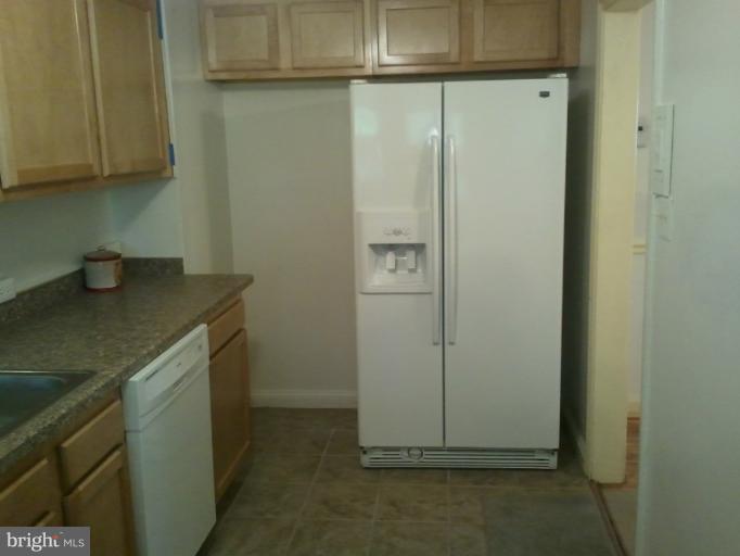 790 Charing Cross Road Baltimore, MD 21229 - Photo 11 of 14 a kitchen with a sink and cabinets