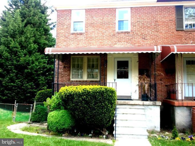 790 Charing Cross Road Baltimore, MD 21229 - Photo 14 of 14 a front view of a house with garden