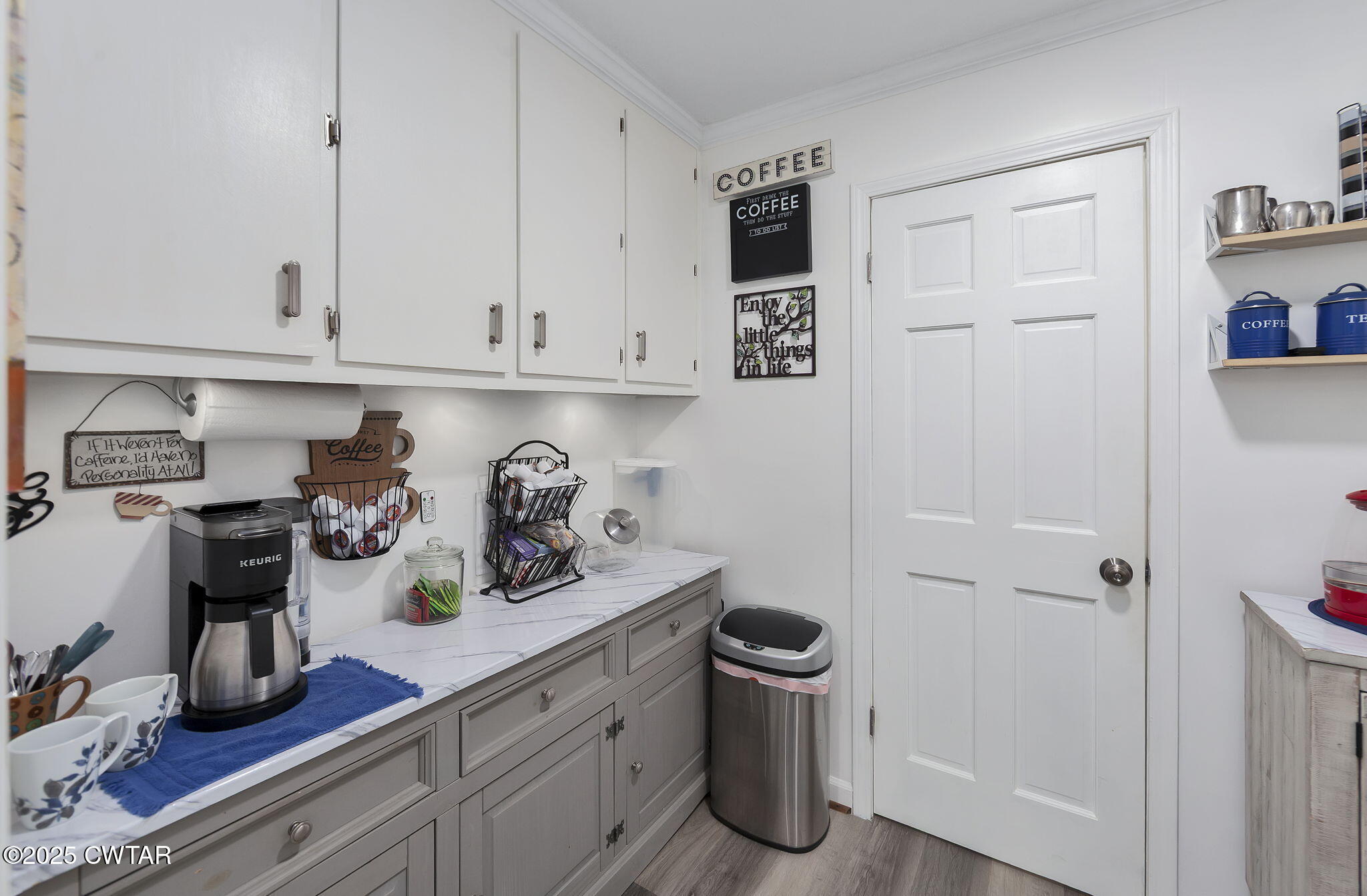 160 Plantation Road Jackson, TN 38305 - Photo 13 of 50 a kitchen with a refrigerator and cabinets