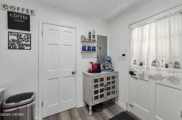 a bathroom with a toilet a sink and a mirror