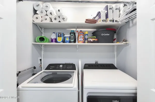 a en suite bathroom with a sink and a mirror