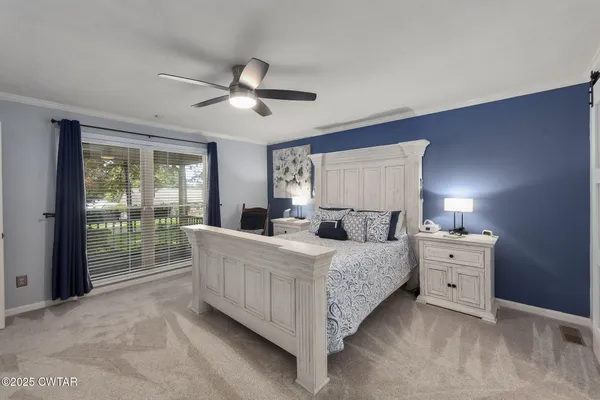 a bathroom with a sink double vanity and a mirror