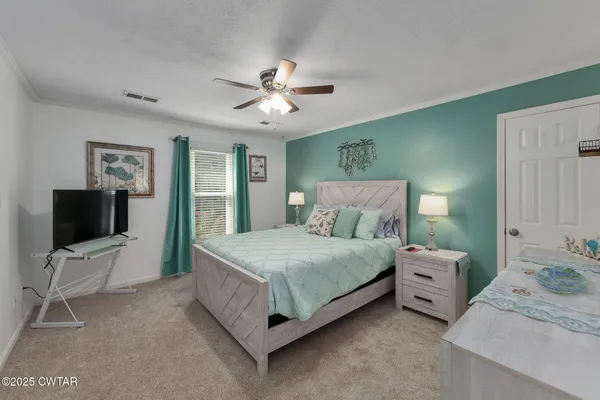 a balcony with trees in front of it