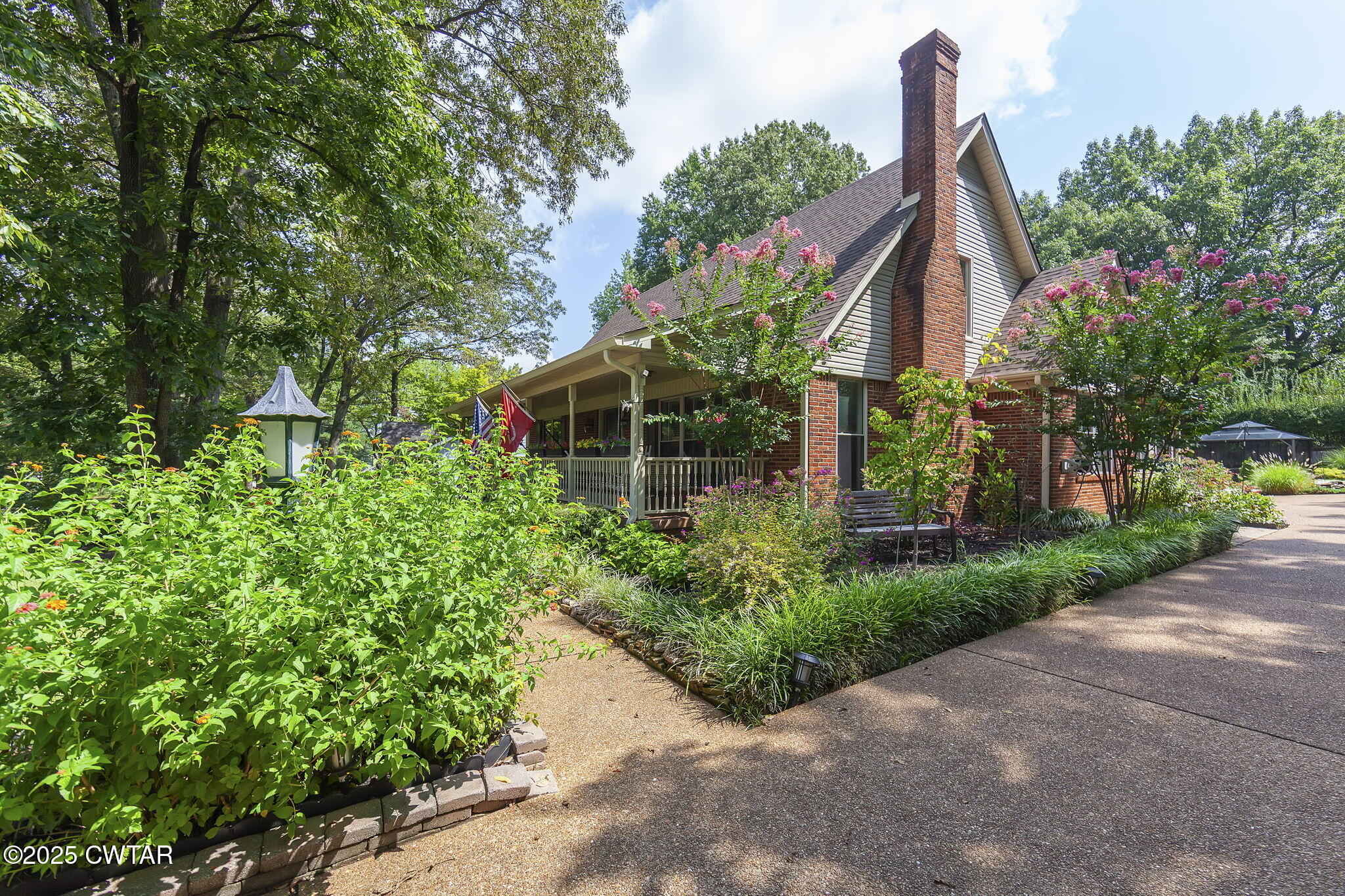 160 Plantation Road Jackson, TN 38305 - Photo 30 of 50 a view of a house with backyard and garden