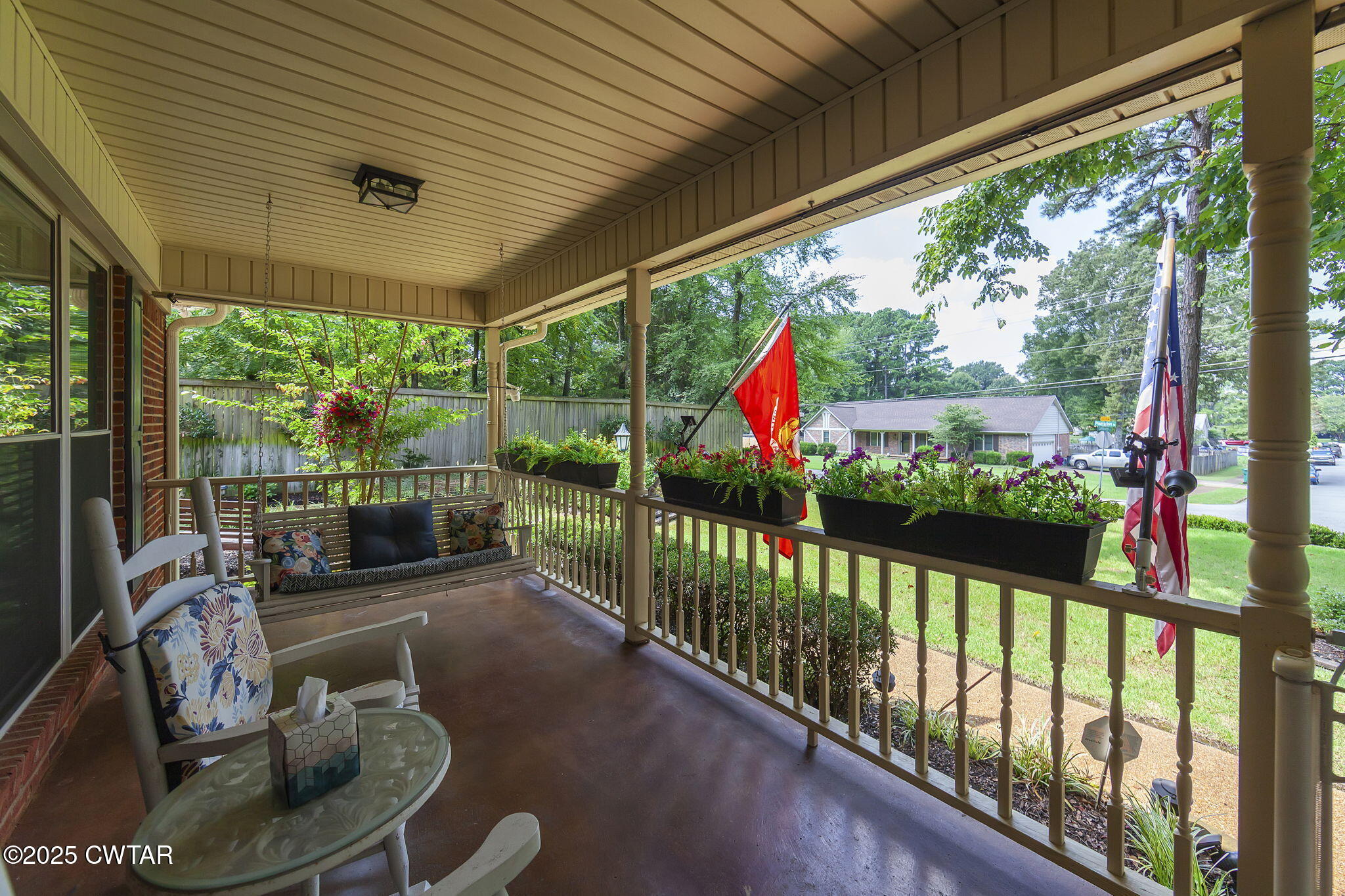 160 Plantation Road Jackson, TN 38305 - Photo 46 of 50 a view of a porch with furniture and a floor to ceiling window