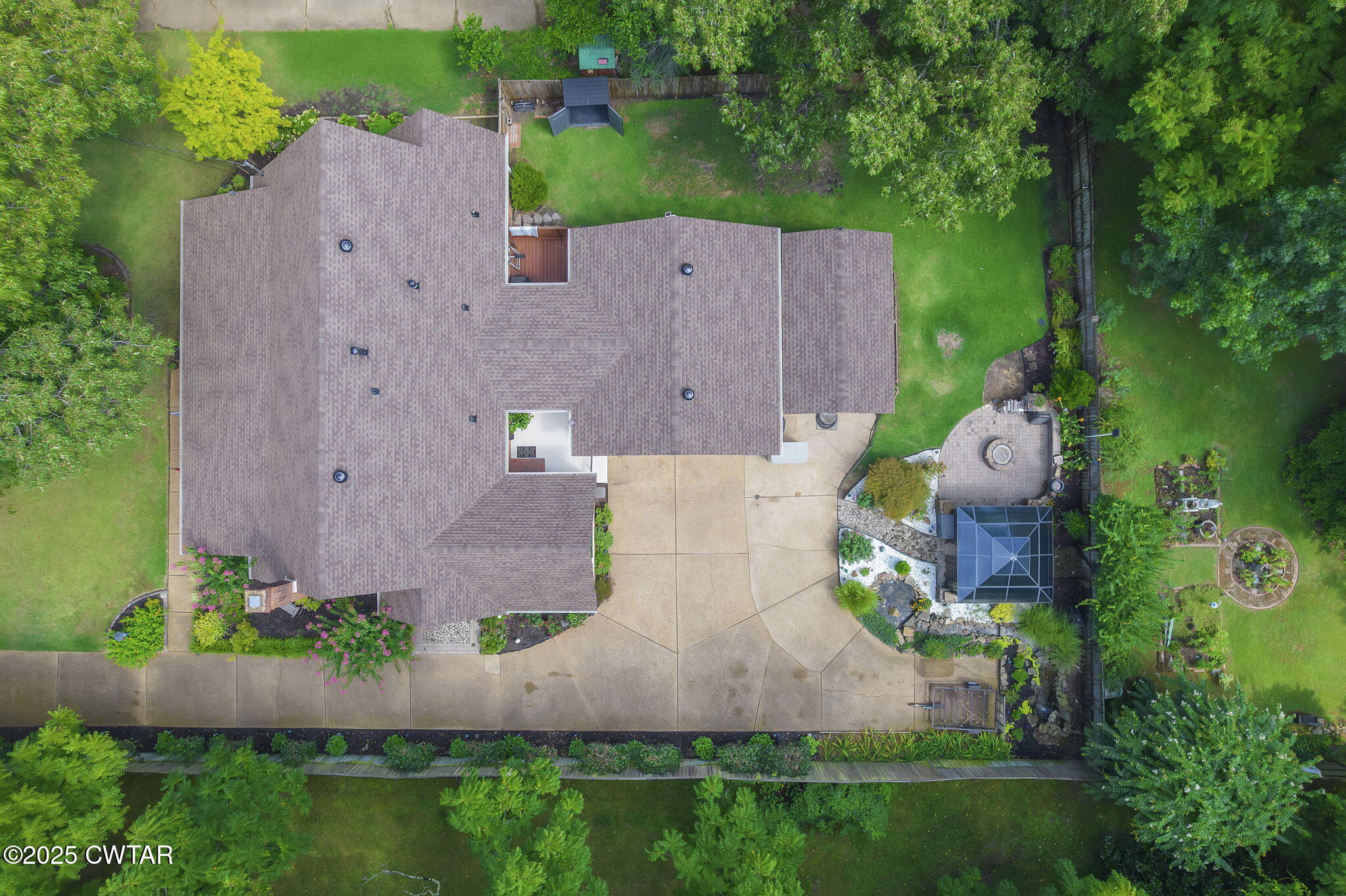 160 Plantation Road Jackson, TN 38305 - Photo 49 of 50 an aerial view of a house with a yard and outdoor seating