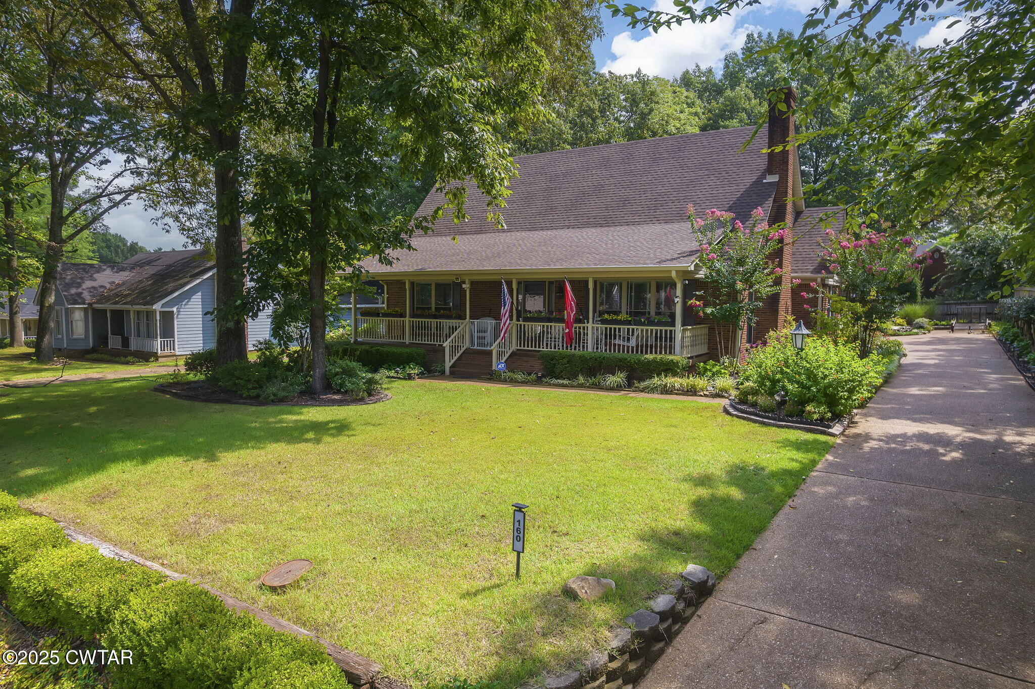 160 Plantation Road Jackson, TN 38305 - Photo 50 of 50 a backyard of a house with yard and outdoor seating