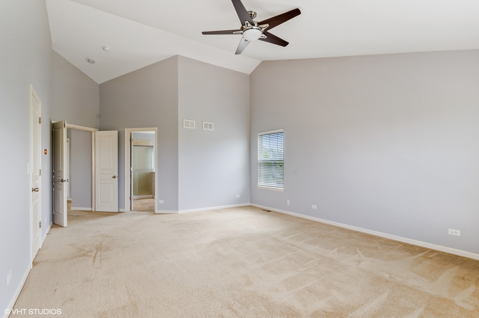 1439 Viola Lane Volo, IL 60073 - Photo 8 of 11 an empty room with fan and windows