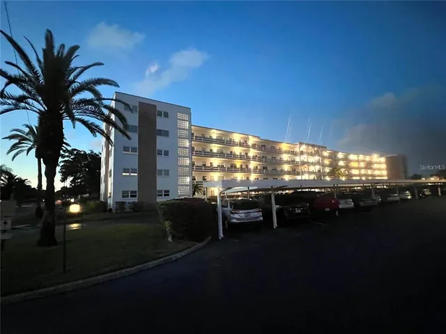 a view of a balcony with chairs