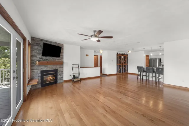 a kitchen with white cabinets stainless steel appliances and sink