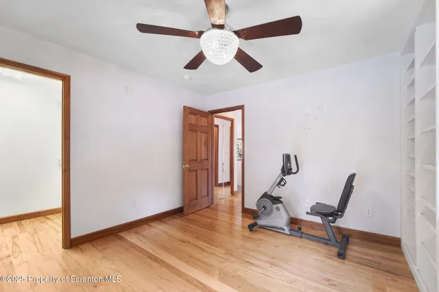 a view of a livingroom with furniture and a window