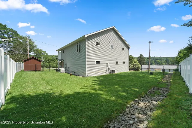 a view of a backyard with garden