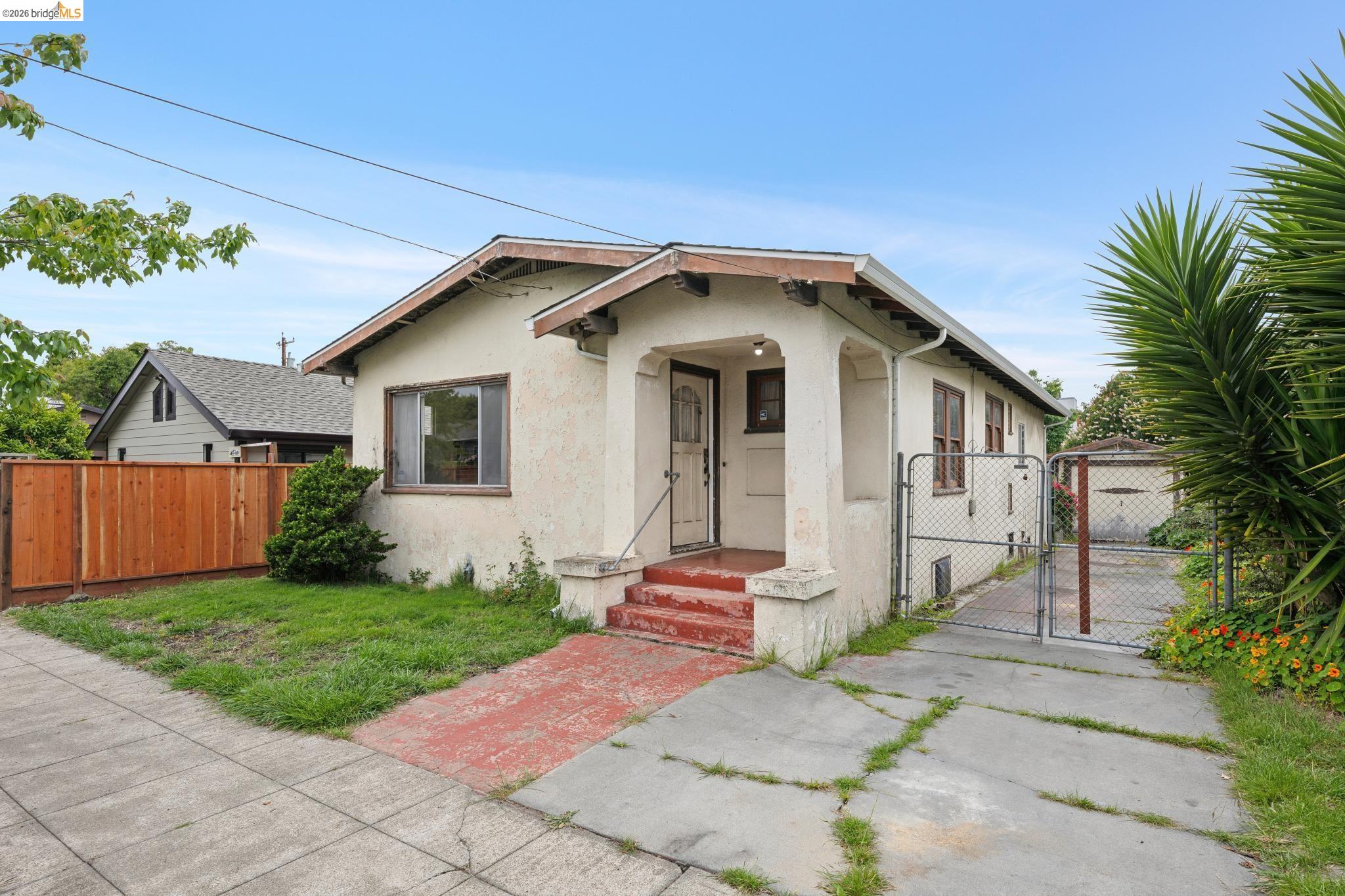 2534 Mathews Street Berkeley, CA 94702 - Photo 1 of 1 a front view of a house with a yard