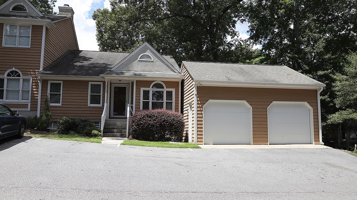 4520 Antique Lane Raleigh, NC 27616 - Photo 1 of 13 Wonderful 2 car garage and parking in front of garage! Exterior Front