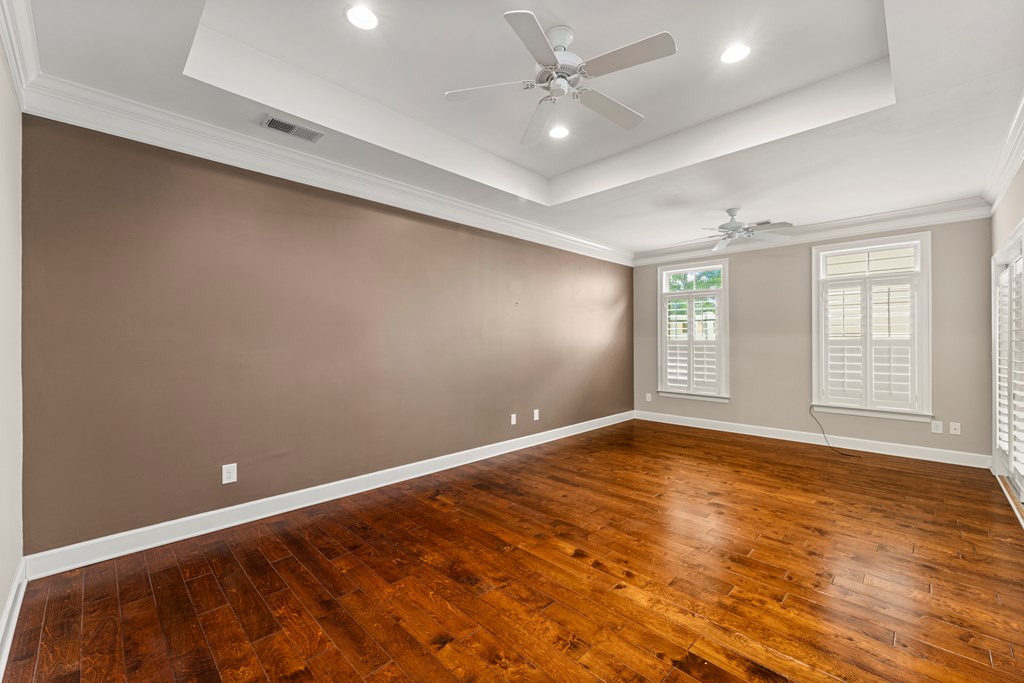 8848 Promenade Place Columbus, GA 31820 - Photo 6 of 21 an empty room with windows and fan