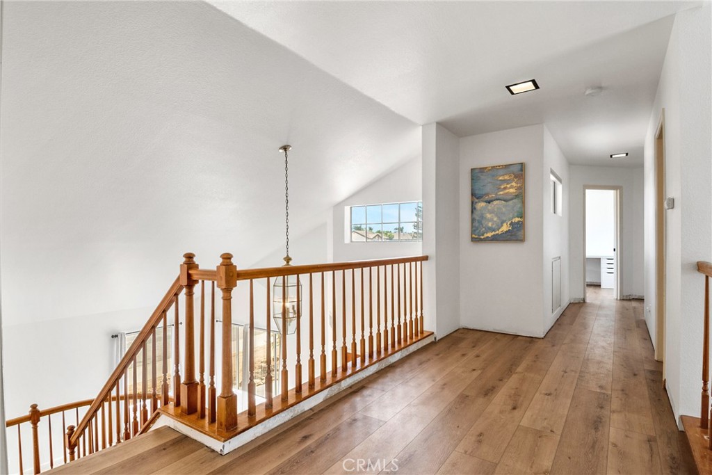 9376 Ruby Red Court Riverside, CA 92508 - Photo 19 of 54 a view of hallway with wooden floor