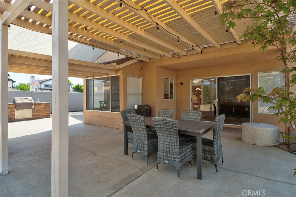 9376 Ruby Red Court Riverside, CA 92508 - Photo 43 of 54 a view of a dining room with furniture window and outside view