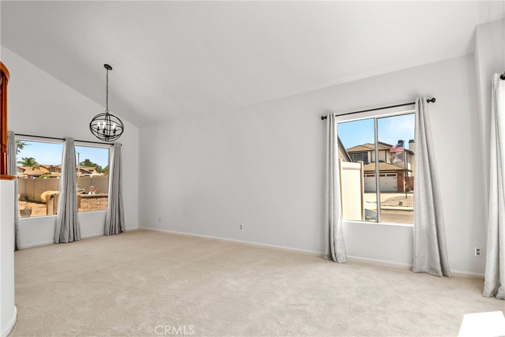 9376 Ruby Red Court Riverside, CA 92508 - Photo 44 of 54 an empty room with windows and closet